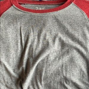 3/4 gray maroon shirt